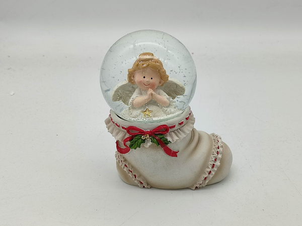 Snow globe angel praying in boot